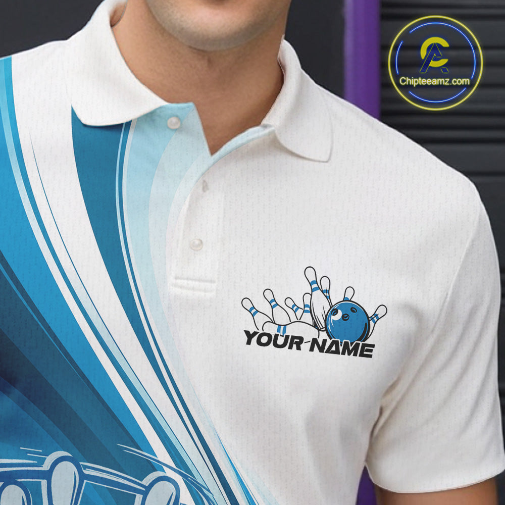 Close-up of the left chest area of a white and blue bowling polo shirt, featuring a dynamic curved bowling action graphic.