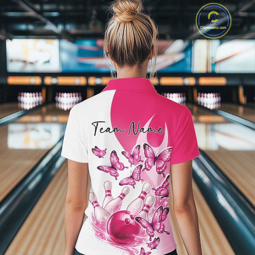 Back view of a female model wearing a white and pink bowling quarter zip with butterfly graphics and bowling artwork