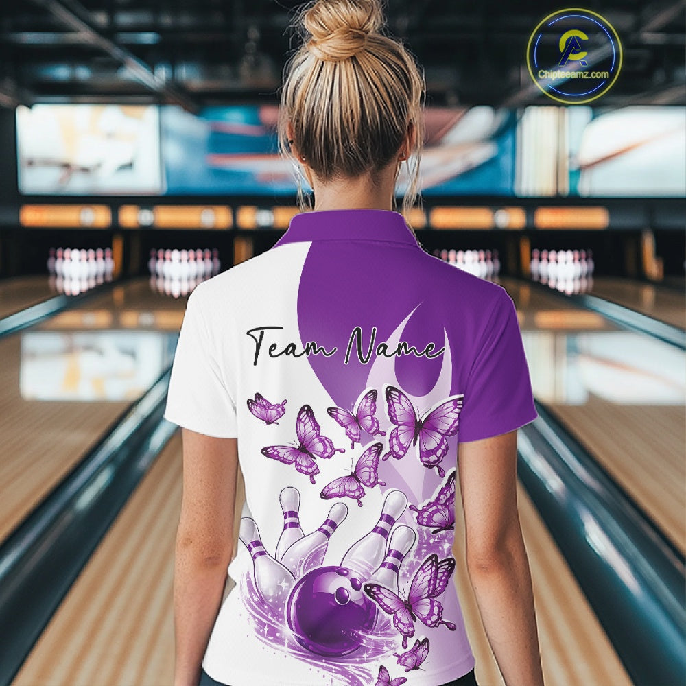 Back view of a female model wearing a white and purple bowling quarter zip with butterfly artwork and bowling graphics
