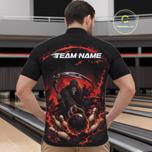 Load image into Gallery viewer, Male model shown from the front wearing a black and red bowling quarter zip shirt with a grim reaper reaching through swirling flames to command a blazing bowling ball striking scattered pins in a bowling lane.