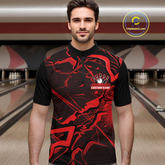 Male model in a bowling alley wearing a black and red quarter-zip with futuristic geometric artwork.