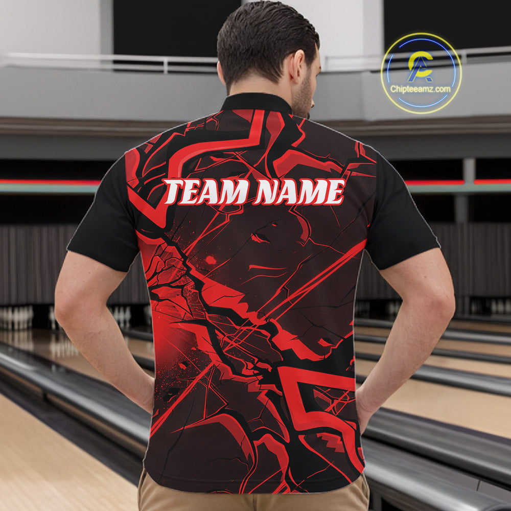 Front view of a mens black and red quarter-zip displaying bold cracked geometric graphics.
