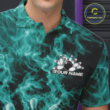 Load image into Gallery viewer, Left chest close-up of a bowling polo featuring a turquoise blue bowling ball crashing through pins with flame graphics.