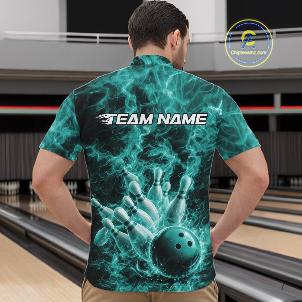 Front view of a mens quarter-zip showcasing a turquoise blue bowling ball hitting pins against flames.