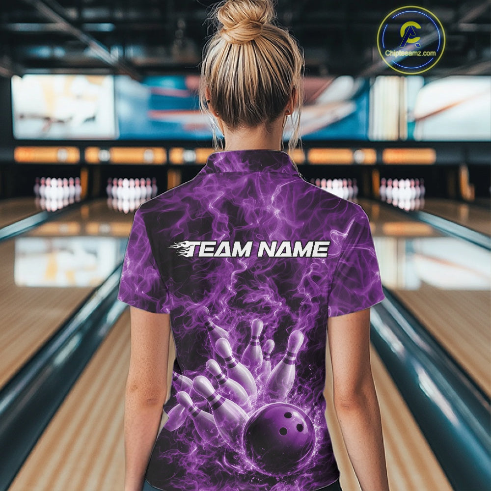 Back view of a womens bowling quarter-zip displaying a purple bowling strike scene with dramatic flames.