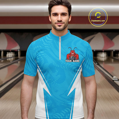Front view of a male model in a bowling alley wearing a blue custom quarter-zip bowling shirt with a funny aggressive crawfish holding a bowling ball in a sportswear-style design.
