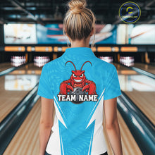 Load image into Gallery viewer, Back view of a female model in a bowling alley wearing a blue custom quarter-zip bowling shirt with a funny aggressive crawfish holding a bowling ball in a sportswear-style design.