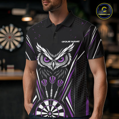 Front view of a man wearing a black darts polo shirt with purple accents, featuring fierce owls framed by dartboards, three darts, and personalized name areas.