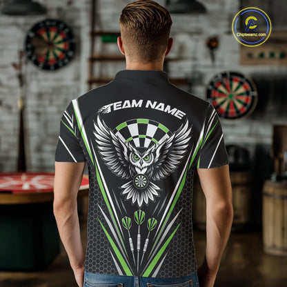 Back view of a man wearing a black darts polo shirt with green accents, featuring fierce owls framed by dartboards, three darts, and personalized name areas.