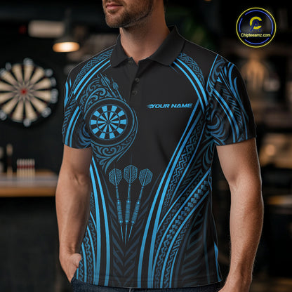 A man wearing a black short-sleeve polo shirt with a blue Polynesian tribal pattern, featuring a dartboard graphic on the chest and three darts. 