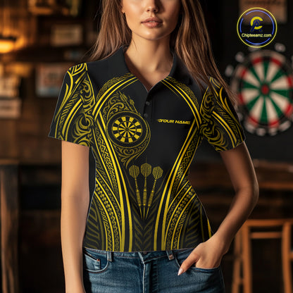 A woman wearing a black short-sleeve polo shirt with a yellow tribal-inspired dartboard pattern