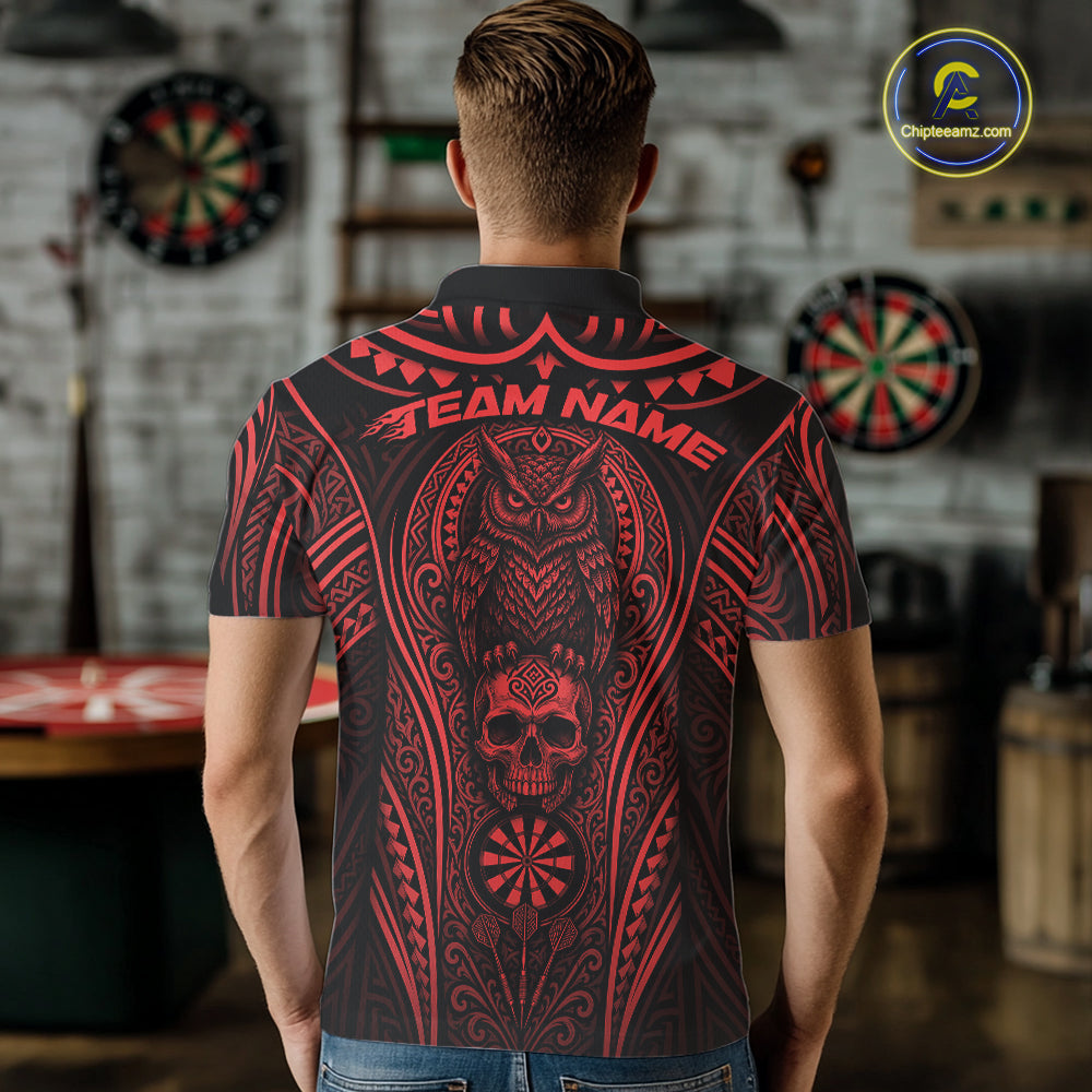 A man viewed from behind wearing a short-sleeve collared shirt with a large red tribal-style graphic featuring an owl, skull, dartboard motifs, and the text 'TEAM NAME' across the upper back. 