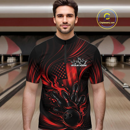 Male model at a bowling lane wearing a black and red bowling quarter-zip shirt with patriotic bowling strike graphics and bold flame details.