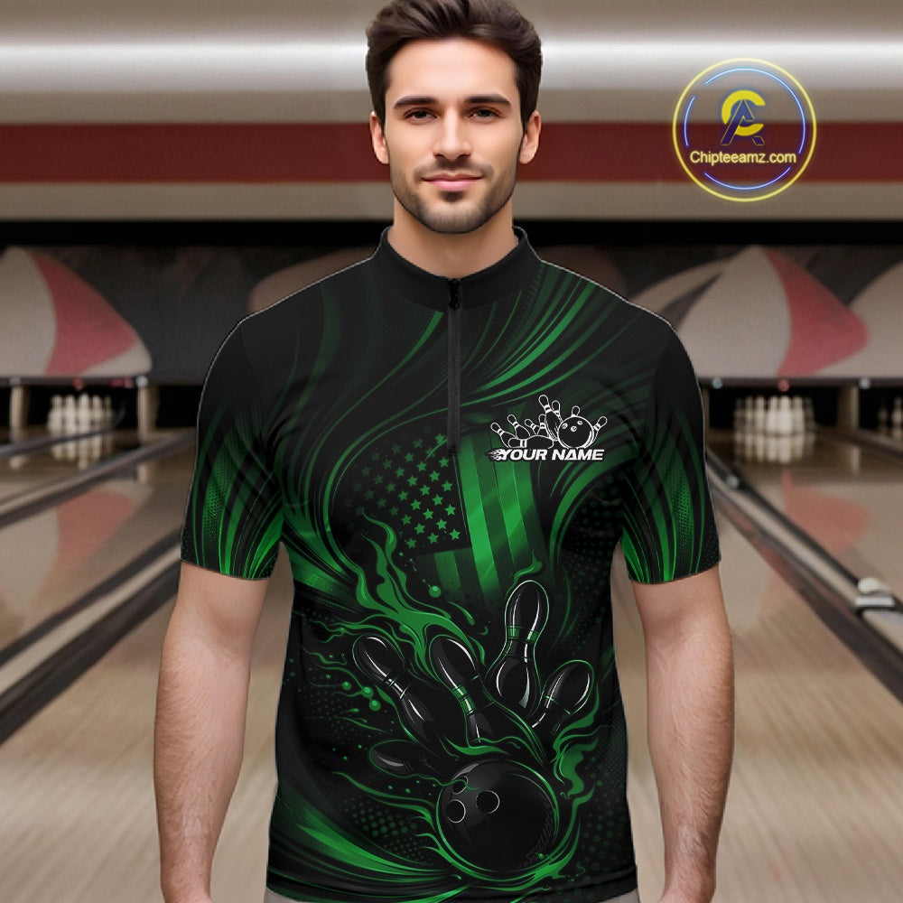 Male model wearing a black and green bowling quarter-zip shirt at a bowling lane with patriotic bowling strike graphics and distressed flag accents.