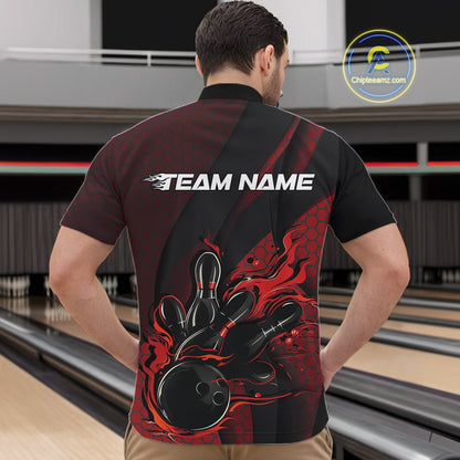 Front view of a male model in a bowling venue wearing a black and red quarter-zip shirt featuring a bowling strike scene with flame effects.