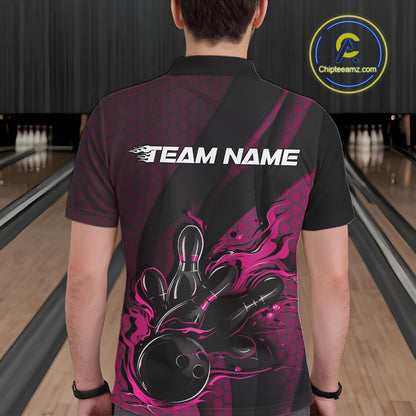 Back view of a male model in a bowling venue wearing a black and pink polo shirt featuring a fiery bowling action graphic.
