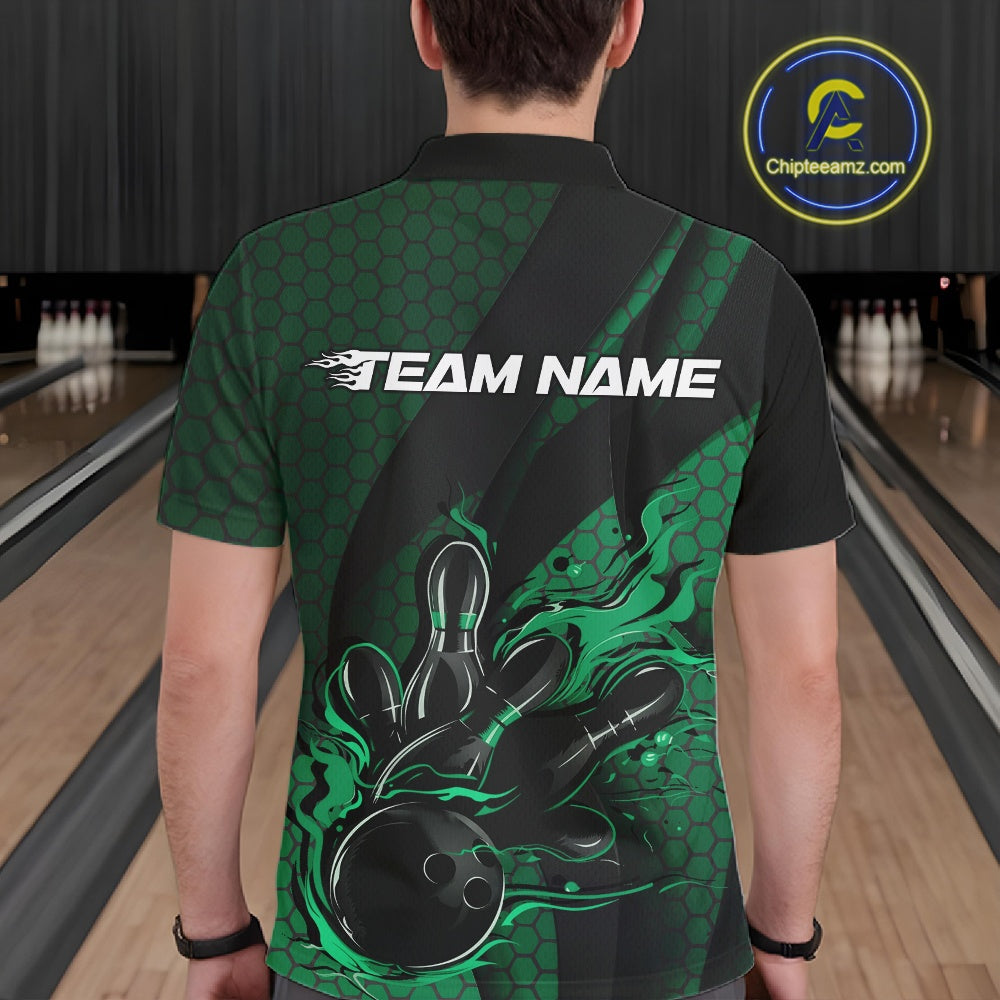 Back view of a male model in a bowling alley wearing a black and green polo shirt featuring a bowling strike design with hexagonal accents.