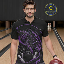 Load image into Gallery viewer, Front view of a male model in a bowling alley wearing a purple custom bowling polo shirt featuring an aggressive dragon with flames in a dynamic and energetic design.