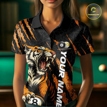 Load image into Gallery viewer, Female model front view wearing a Billiard polo shirt with roaring tiger graphics, orange claw marks, and billiard balls.
