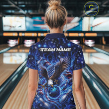 Load image into Gallery viewer, Female model back view at the bowling lane wearing a polo shirt with eagle reaching toward a bowling ball, flag accents, pins, and blue flames.