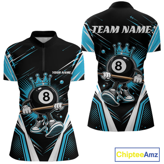 Front and back views of a women's short-sleeve billiards quarter zip shirt on a white background. The jersey is primarily black with bright blue and white graphic patterns, featuring a cartoon crowned 8-ball character holding a cue stick
