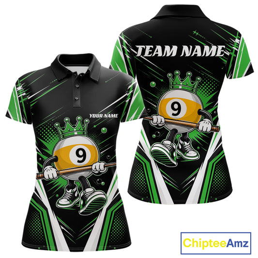 A womens short-sleeve polo shirt shown from the front and back on a white background. The shirt has a black base with bold green and white graphic patterns and a cartoon billiard 9-ball character wearing a crown and holding a cue stick.
