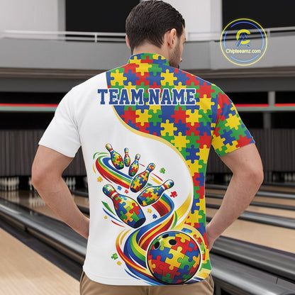 At Bowling Alley, Front View Male Model In White Quarter-Zip Shirt Displaying Autism-Themed Bowling Strike Illustration And Multicolor Puzzle Pattern Design