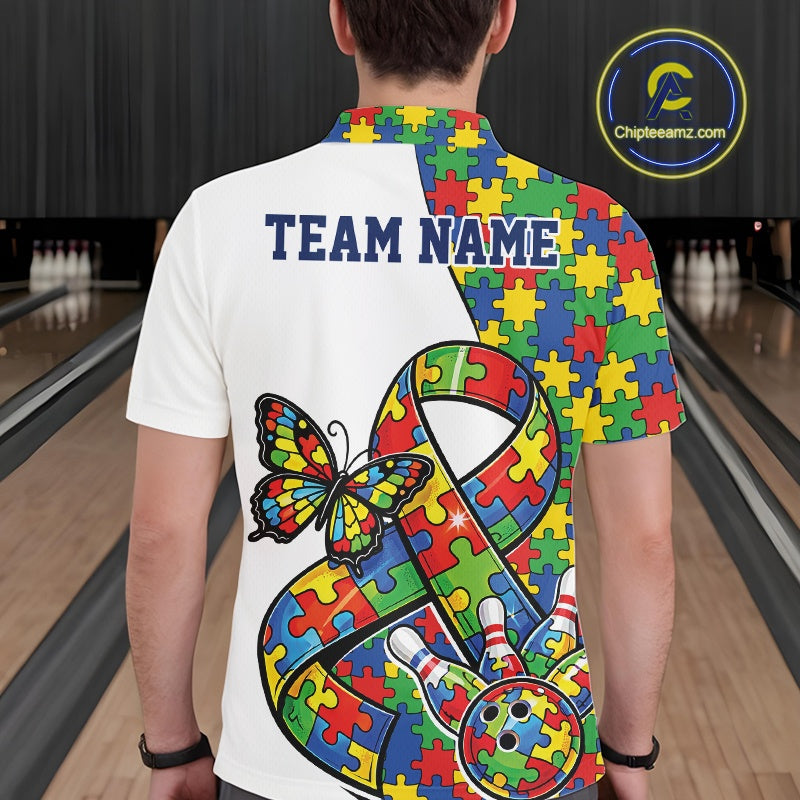Male model at a bowling lane, back view of white polo shirt showcasing autism ribbon puzzle design, butterfly, and bowling strike illustration