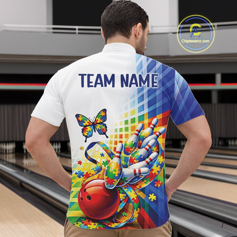 Male model in a bowling lane wearing a white and blue quarter-zip shirt, puzzle-themed bowling design with butterfly and ribbon motion graphics.
