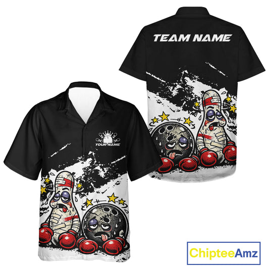 Front and back view of a button-up bowling shirt mockup in black and white, featuring cartoon boxing bowling ball and pin illustrated as beaten-up fighters.