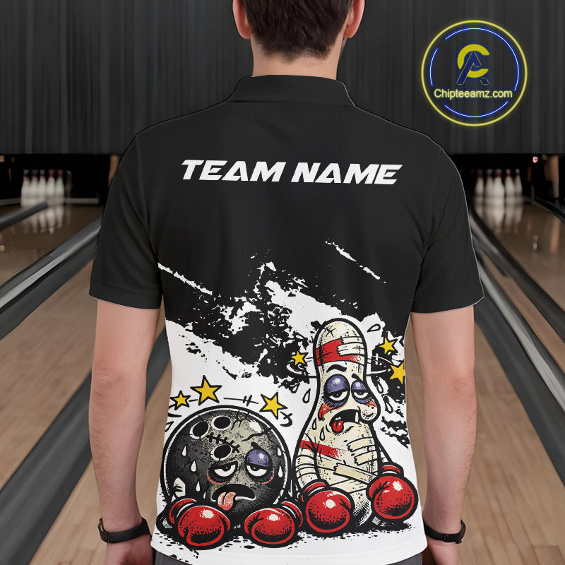 Back view of a male bowler wearing a black and white polo shirt, boxing-style bowling ball and pin design with humorous beaten-up character illustration.