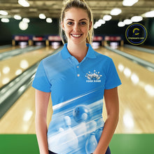 Load image into Gallery viewer, Female model front view in a bowling lane wearing a blue polo shirt with bowling ball and pins over a pink geometric background.
