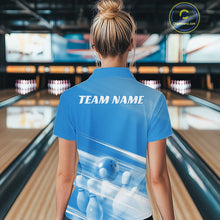 Load image into Gallery viewer, Back view female model in a bowling lane wearing a blue quarter zip shirt with bowling ball and pins over a pink geometric background.