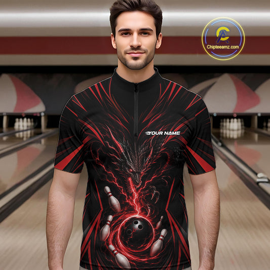 A man wearing a black short-sleeve zip-up bowling jersey with a red and black dragon with bowling pins and a bowling ball on the front. 