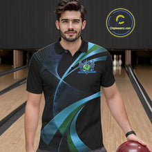 Load image into Gallery viewer, Man wearing a black and blue bowling shirt with a logo on a bowling alley.