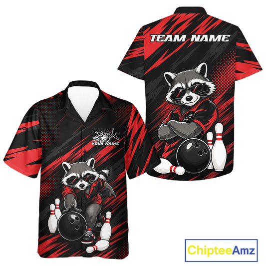 Front and back views of a short-sleeve bowling-themed button-up shirt on a white background. The shirt features a black and red abstract brushstroke pattern with a cartoon raccoon wearing sunglasses, bowling balls, and white bowling pins.