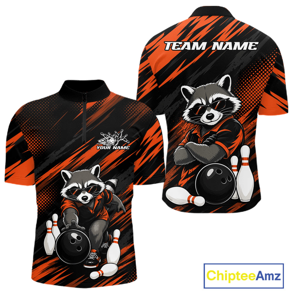 Front and back views of a short-sleeve bowling-themed quarter zip shirt. The design features a cartoon raccoon wearing sunglasses, bowling with a black bowling ball and white bowling pins, set against a black and orange diagonal striped pattern.
