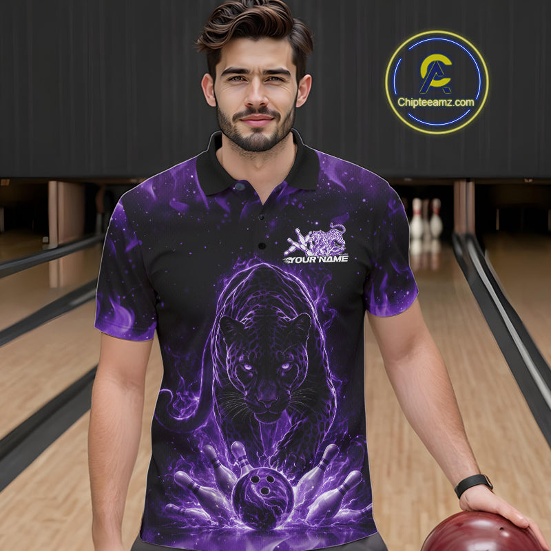 Front view of a male model in a bowling lane wearing a black polo shirt with glowing purple electric panther and energetic bowling strike illustration.