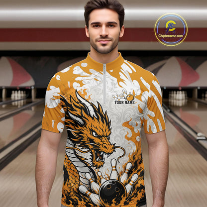 Man wearing a bowling shirt with a dragon design in a bowling alley.