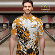 Load image into Gallery viewer, Man wearing a bowling shirt with a dragon design in a bowling alley.