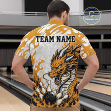 Load image into Gallery viewer, Man wearing a bowling shirt with a dragon design and 'TEAM NAME' text in a bowling alley.