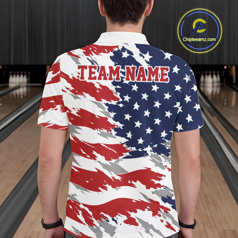 Person wearing a polo shirt with an American flag design in a bowling alley.