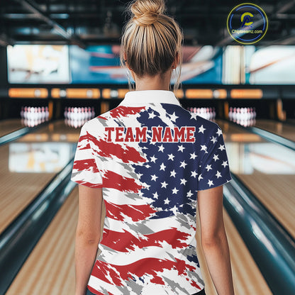 Person wearing a shirt with an American flag design in a bowling alley.