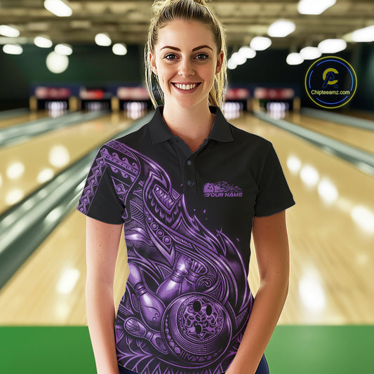 Female model wearing a black and purple bowling polo shirt at the bowling lane with Polynesian-style bowling graphics.