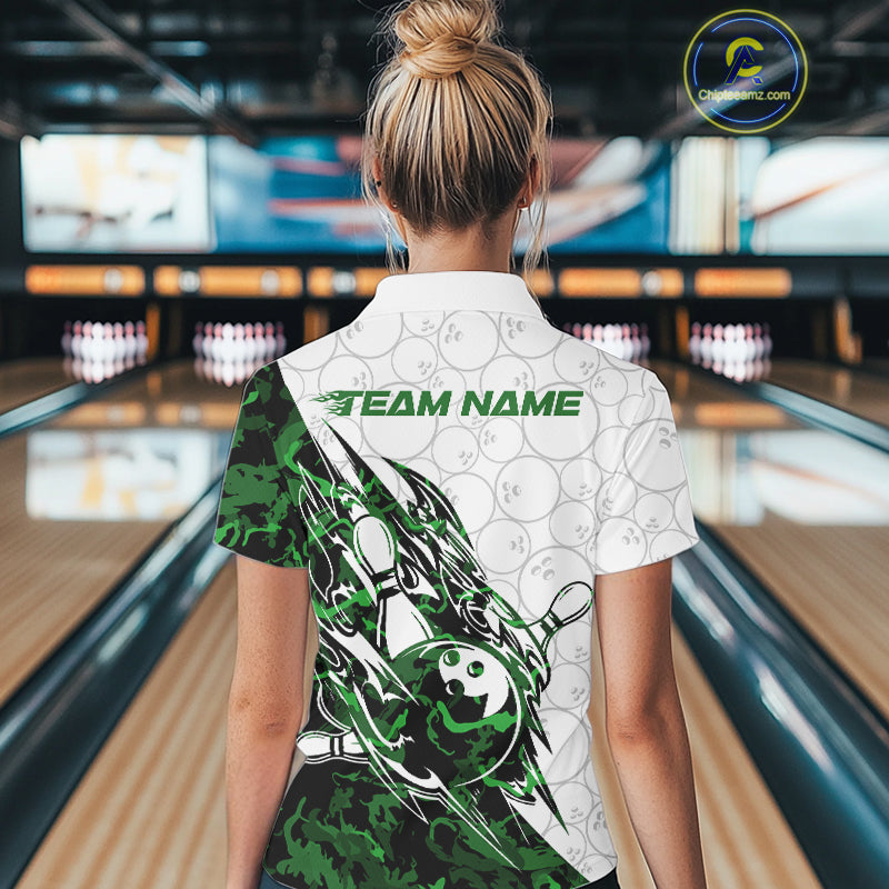 Back view of a female model in a white bowling quarter-zip shirt displaying green camo streak accents and bowling motifs.