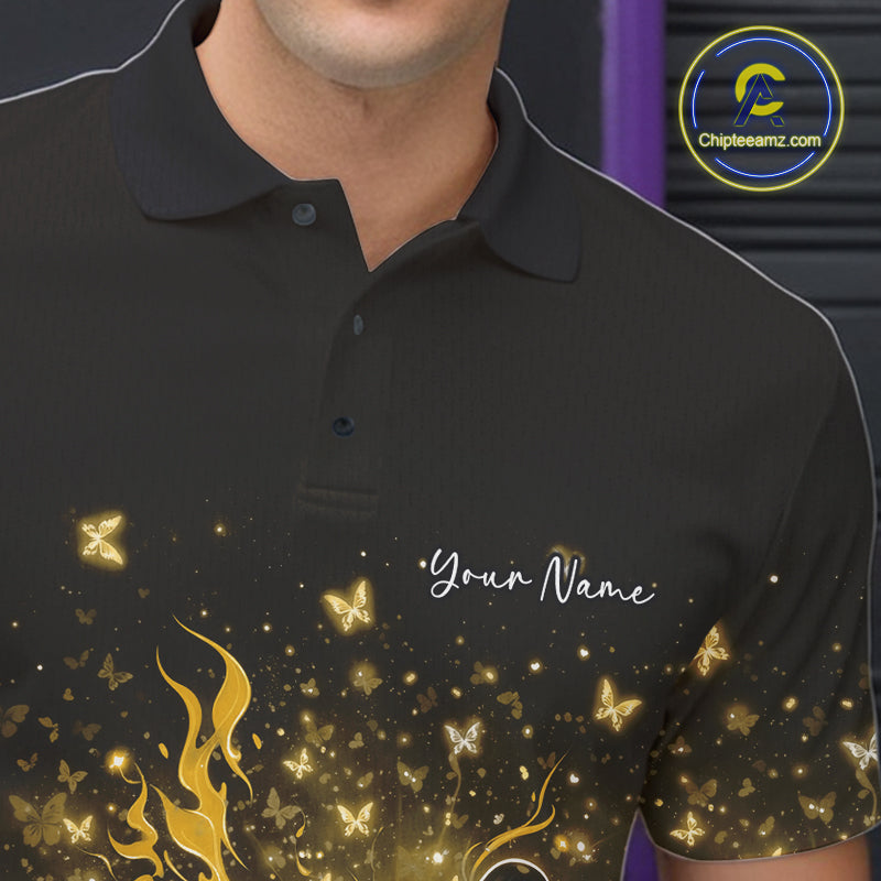 Close-up left chest detail of a black and yellow bowling polo shirt featuring flames, pins, and sparkly butterflies.