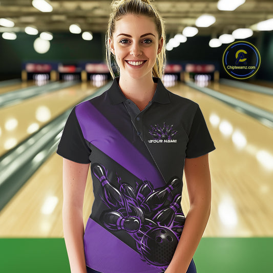 Female model front view in bowling lane wearing black and purple polo shirt with flaming bowling ball hitting pins in energetic sports action design.