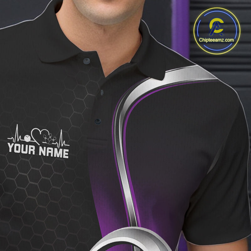 Close-up of the left chest area of a black and purple bowling polo shirt, featuring honeycomb texture with a heart-shaped bowling ball and pins graphic.