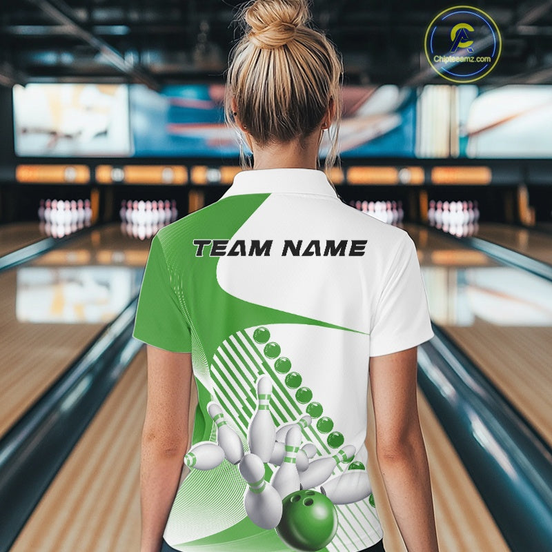 Back view of a women s white and green bowling quarter zip displaying asymmetric geometric stripe accents and dynamic bowling strike graphics.