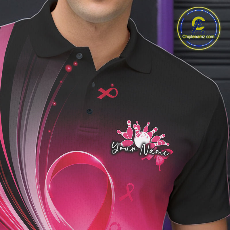 Close-up left chest view of a black and pink bowling polo with breast cancer awareness ribbon graphics and bowling artwork